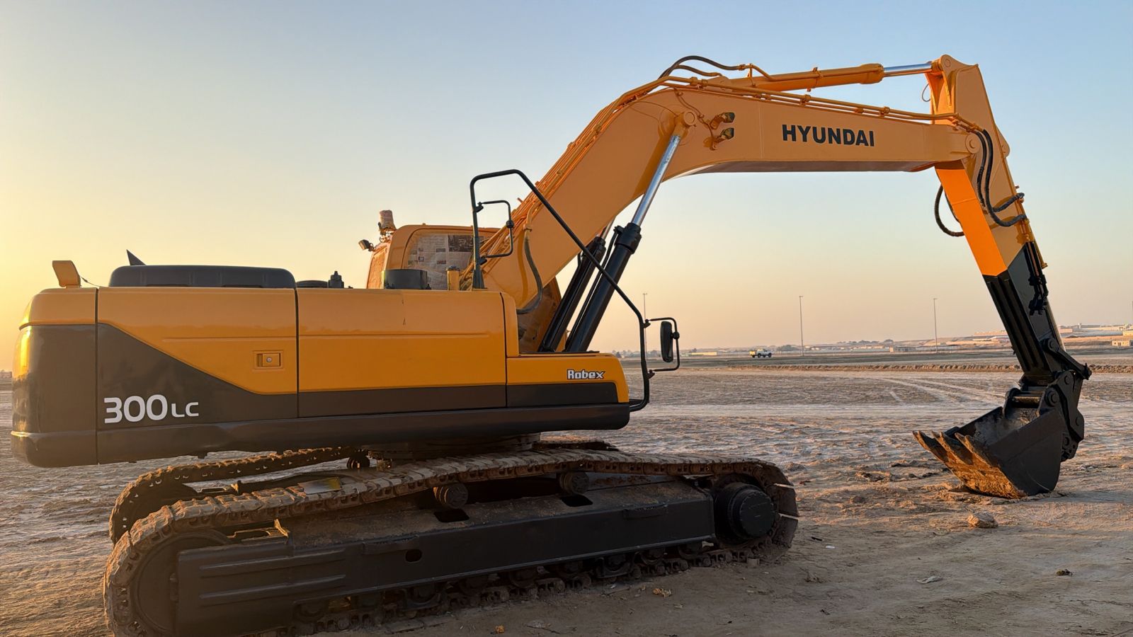 Hyundai 300LC — Sunset at Site